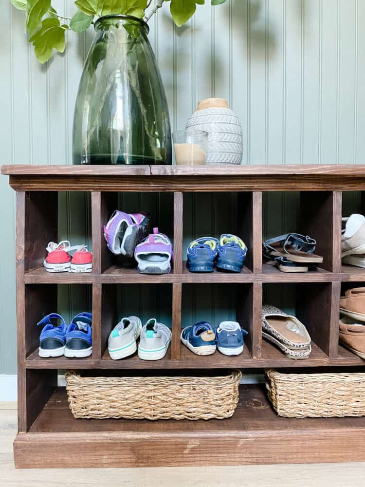 close up of shoe cubby with shoes in it 