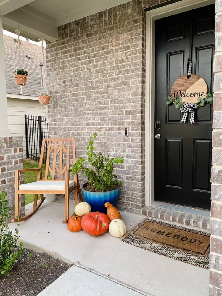 front porch decorated for fall