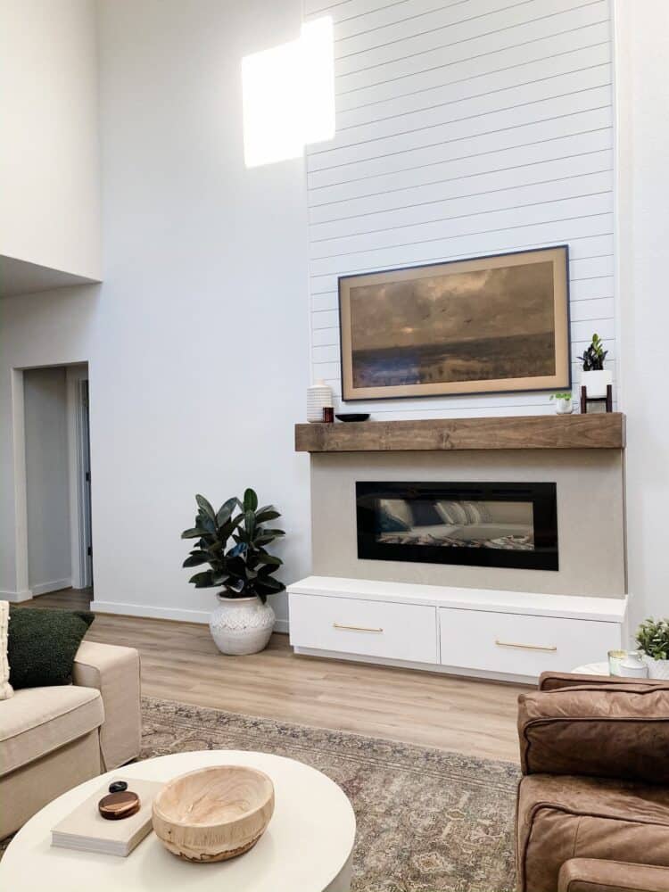 Living room with two-story electric fireplace 