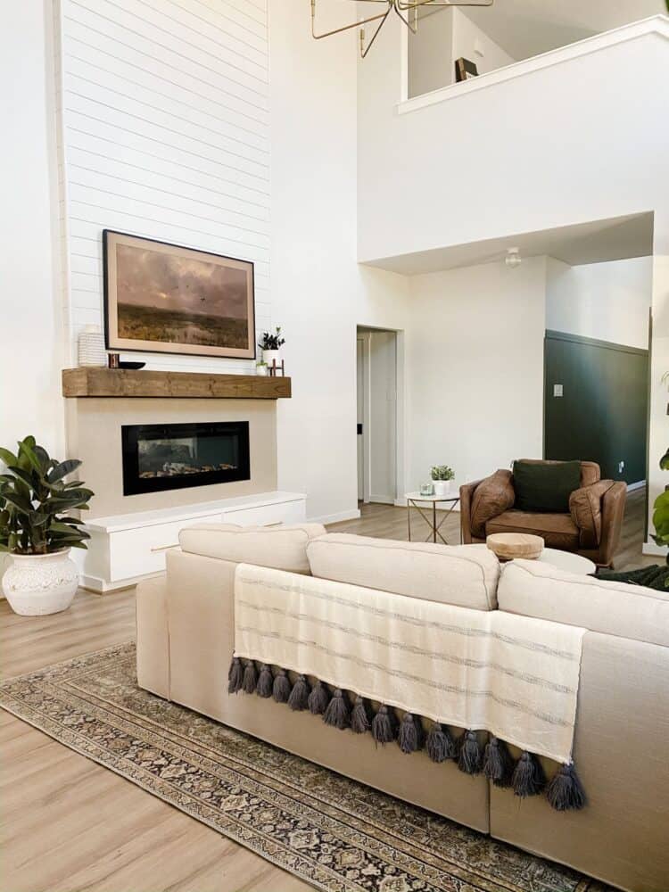 Living room with two-story fireplace