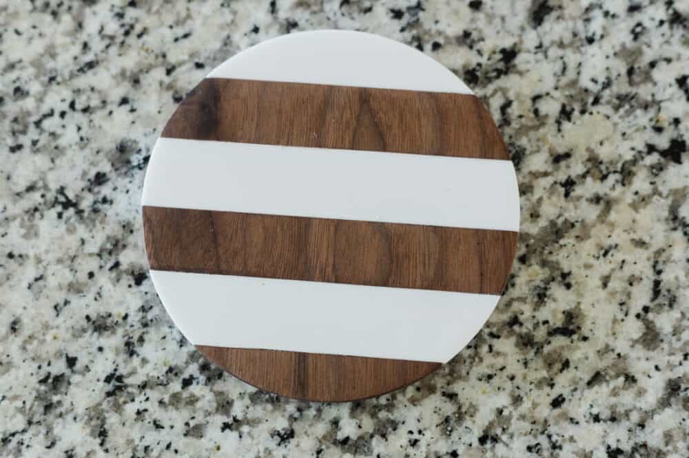walnut and corian striped trivet carved using the Inventables X-Carve 