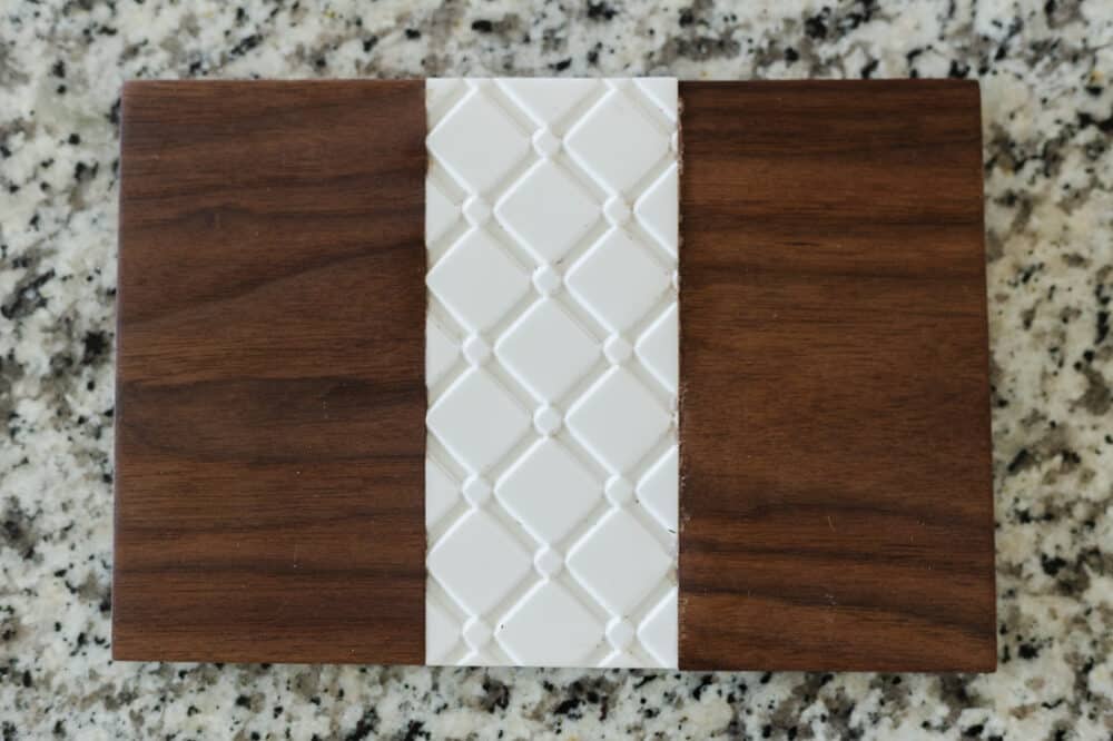 Wood and corian trivet created using the X-Carve 