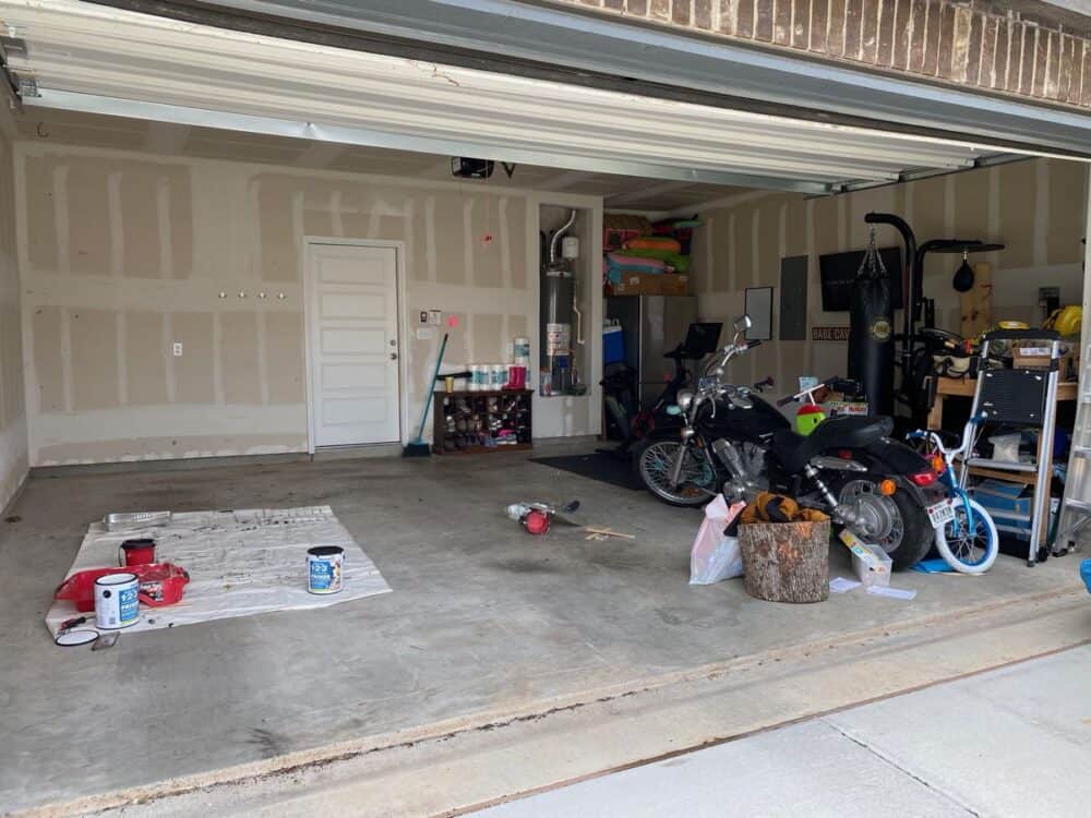 garage with bare floor and drywall