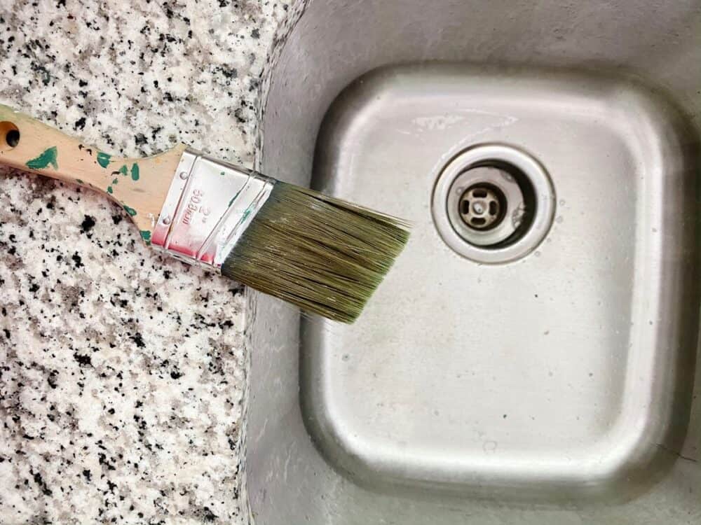 paintbrush drying on a counter