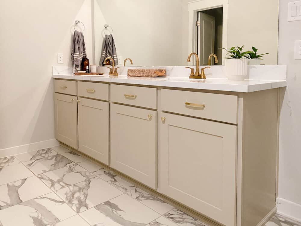 bathroom vanity with painted cabinets and epoxy countertop