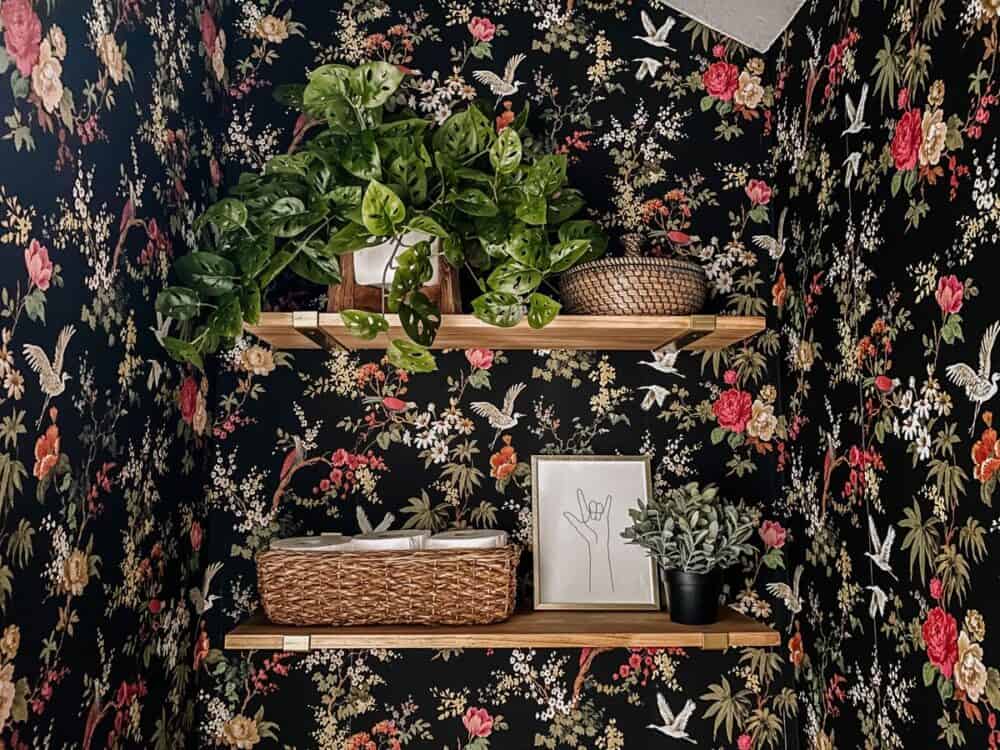 two simple shelves hanging in a water closet 