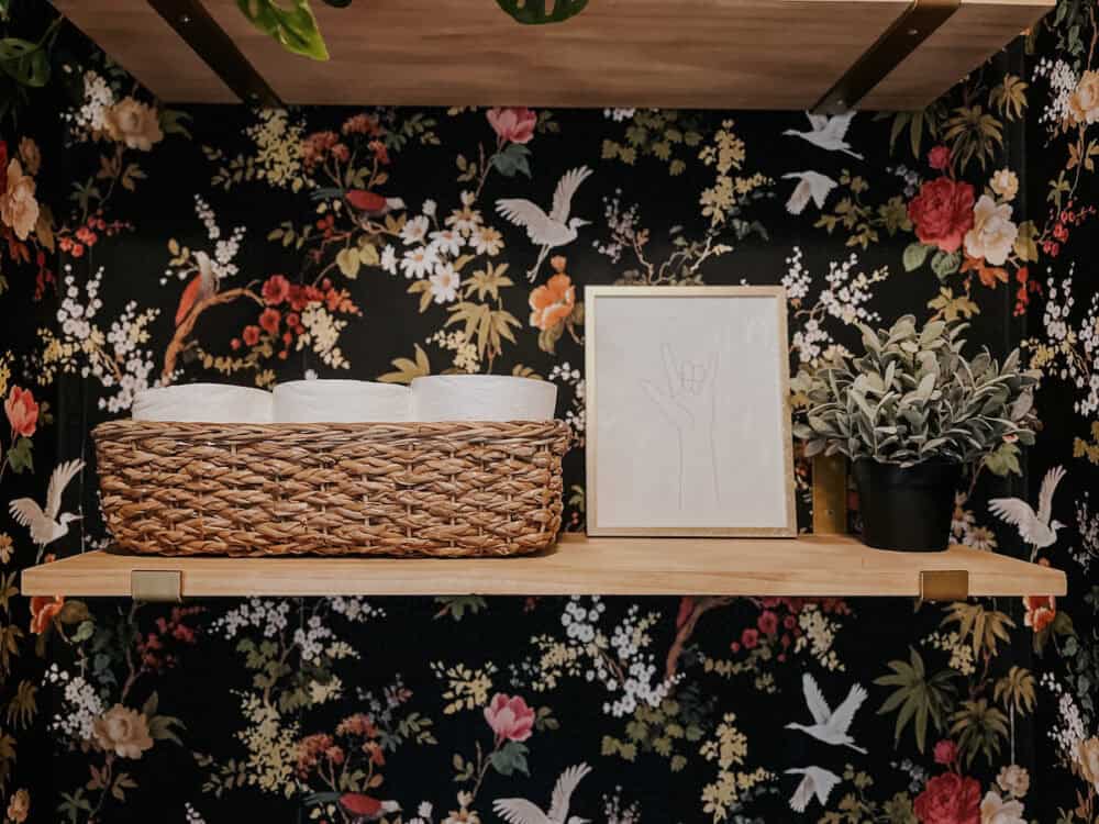 shelf in water closet above toilet