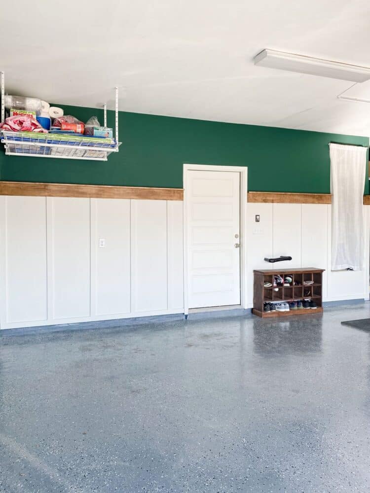 garage with green walls and a board and batten accent wall