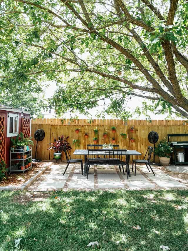 backyard pea gravel patio styled