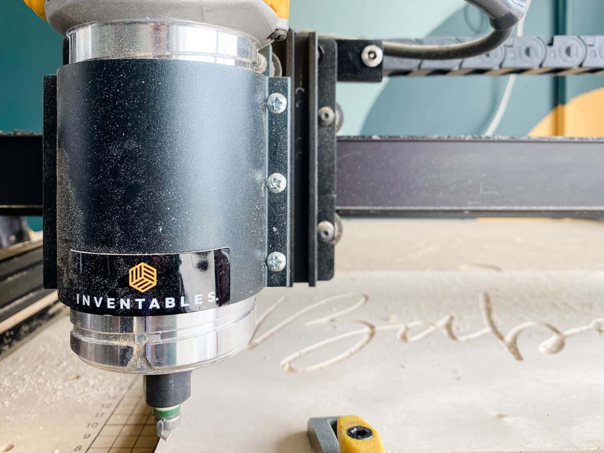 close up of Inventables x-carve after carving a sign
