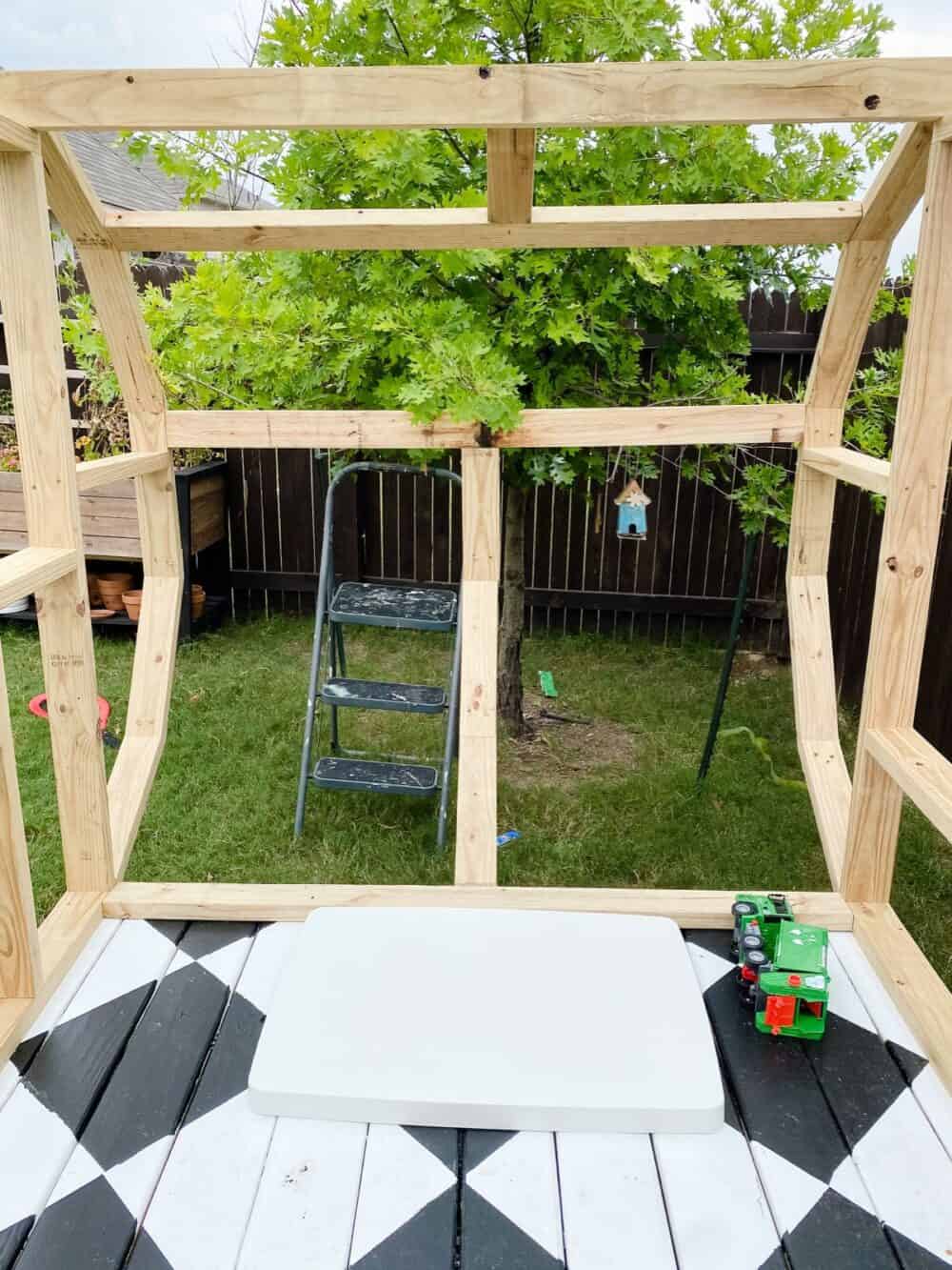 Curved wall of DIY playhouse camper 