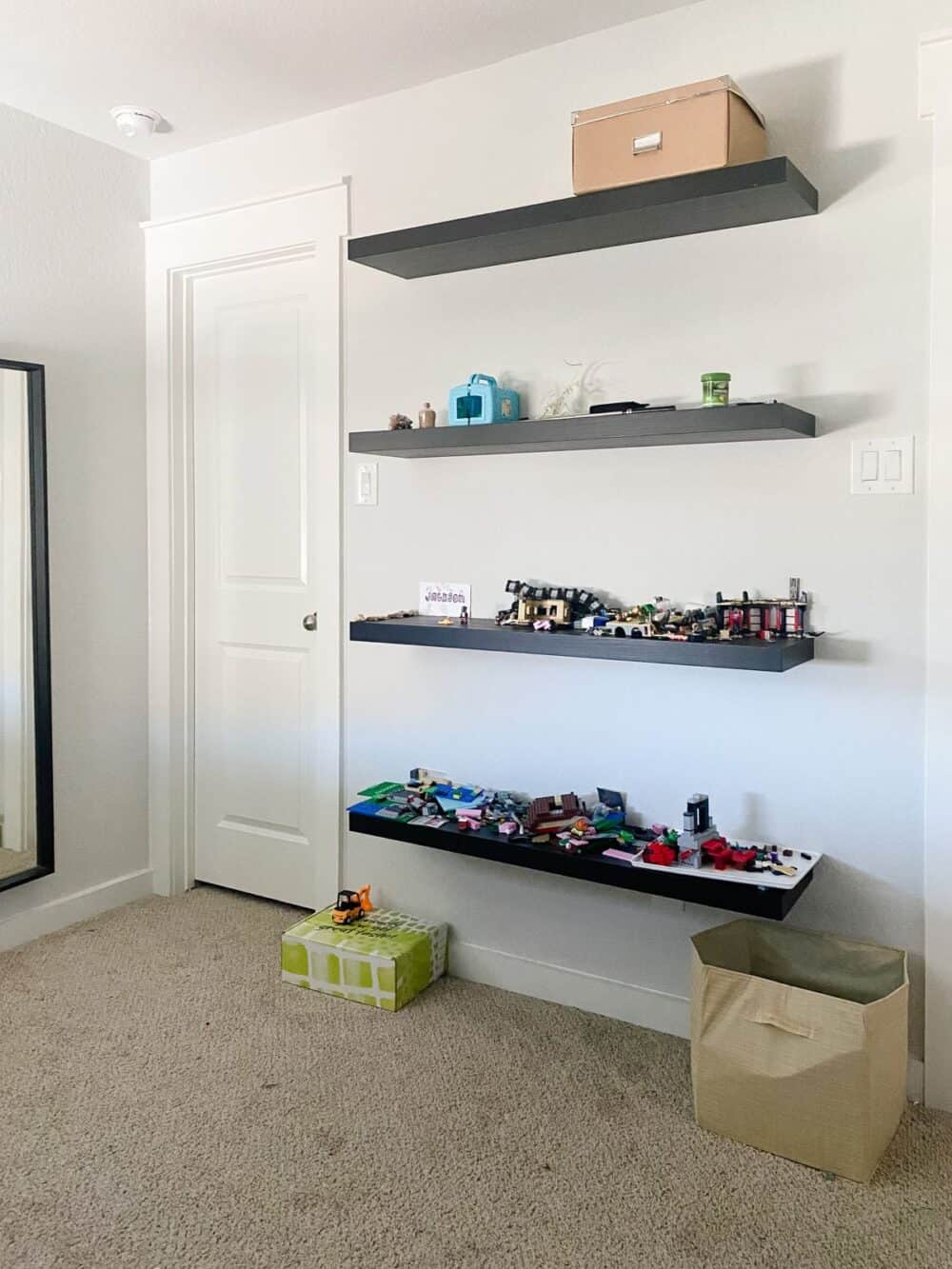 Wall with shelves, before installing wood accent wall