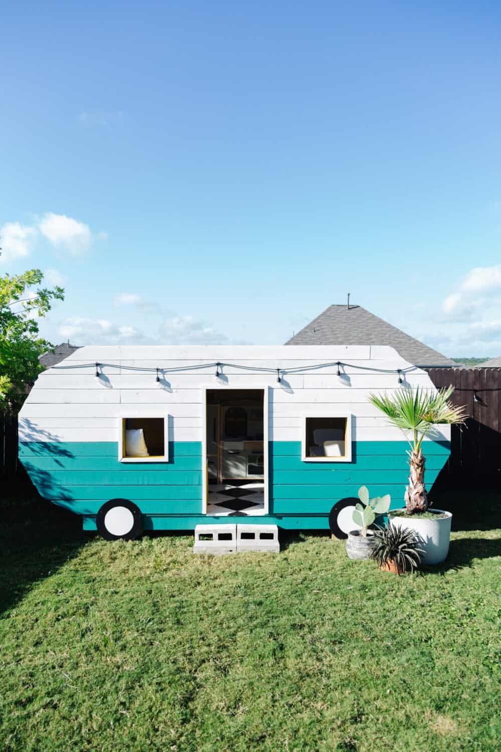 Backyard with camper playhouse