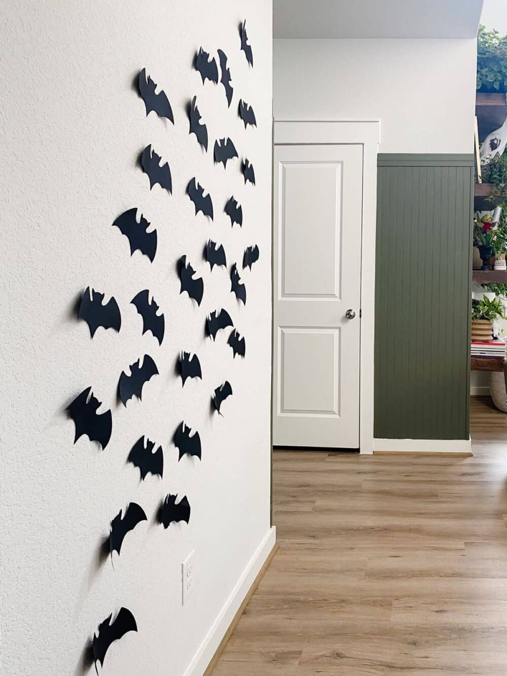 wall with paper bats taped to it for Halloween