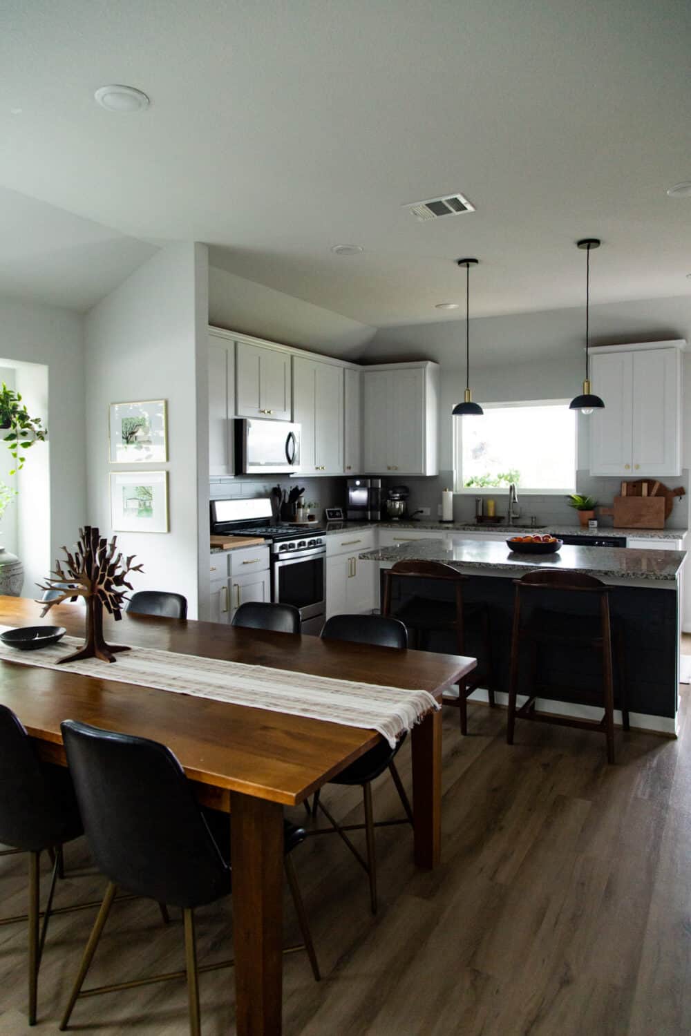 A neutral and simple dining room and kitchen 