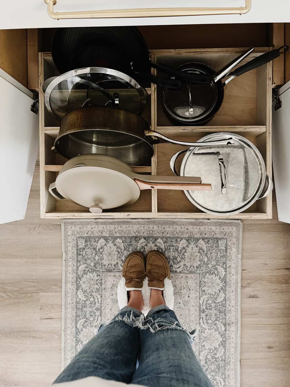 Overhead view of DIY pull out pot and pan organizer 