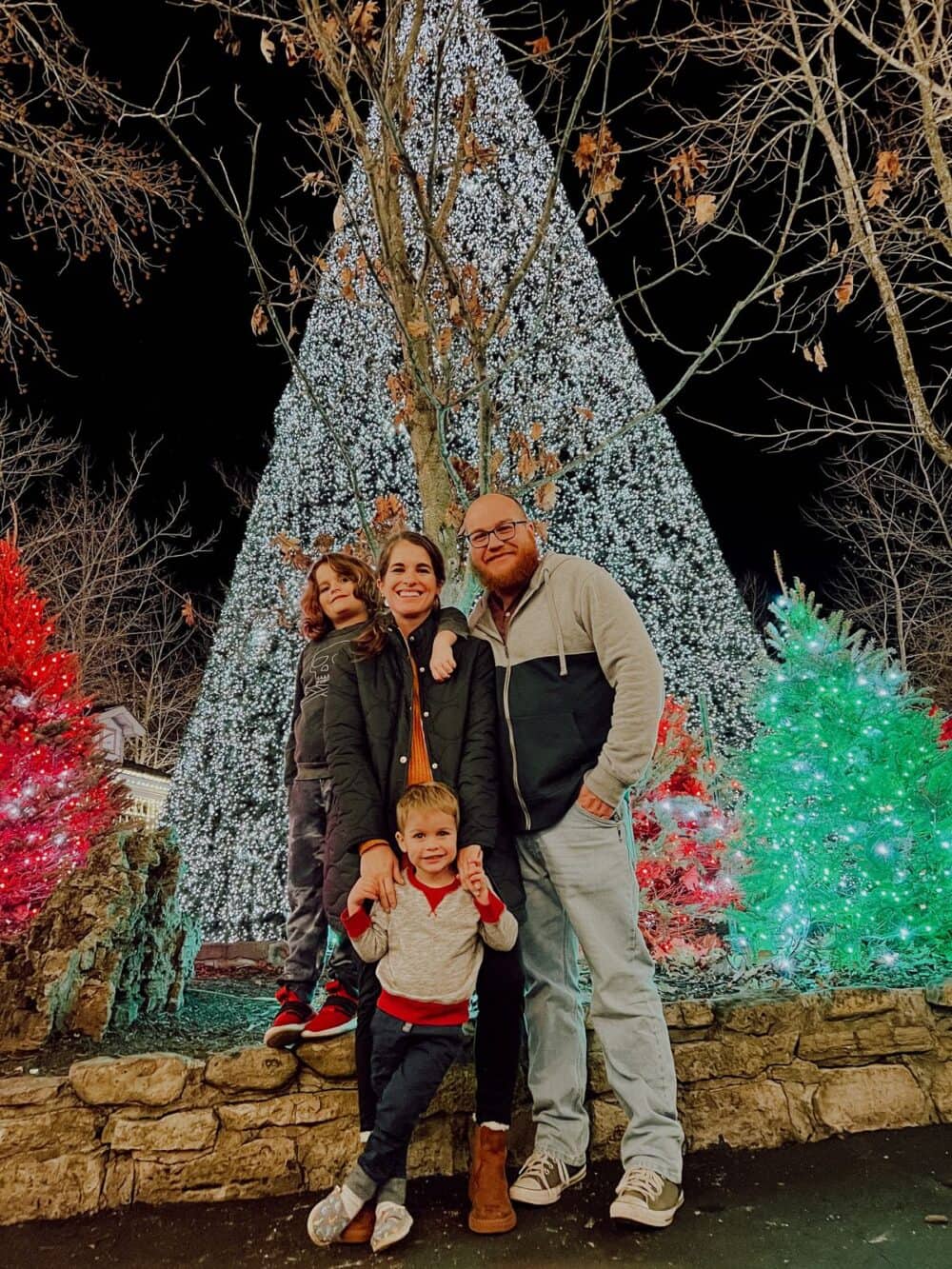 family posing in front of lights at Silver Dollar City in Branson, Missouri