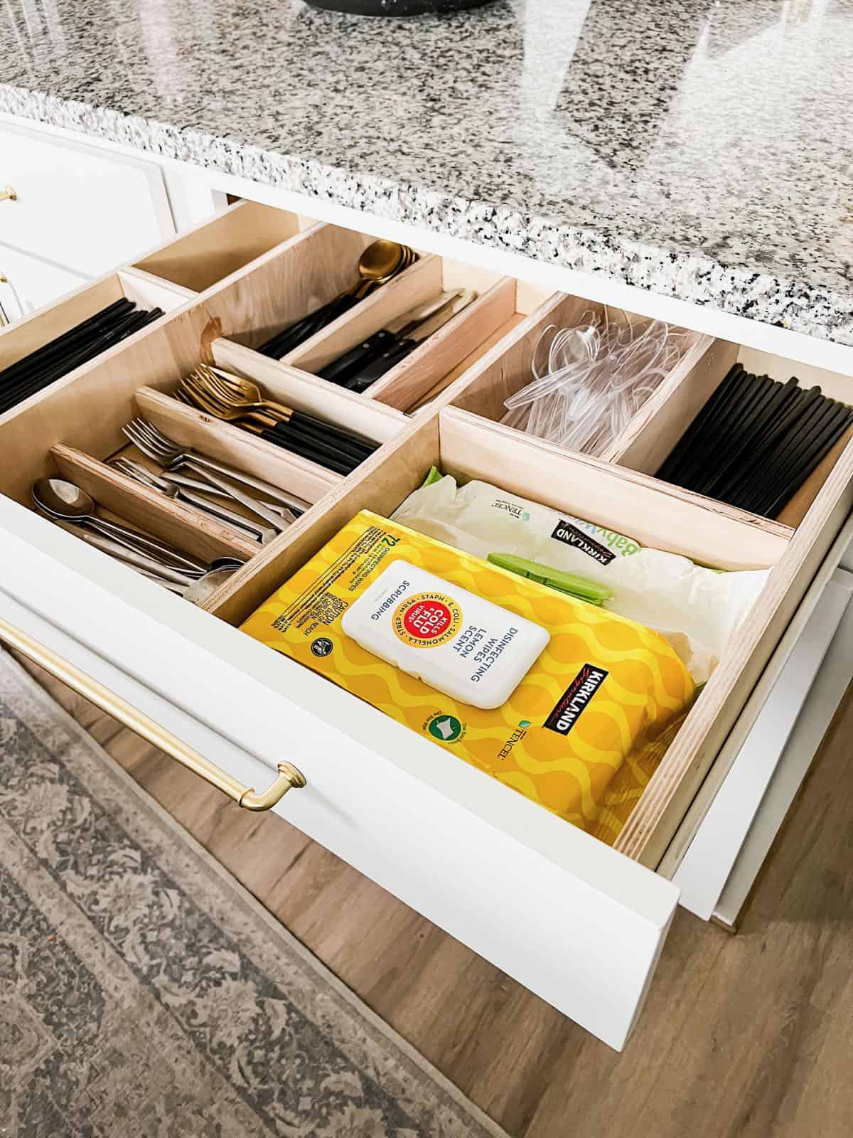 close up of organized silverware drawer