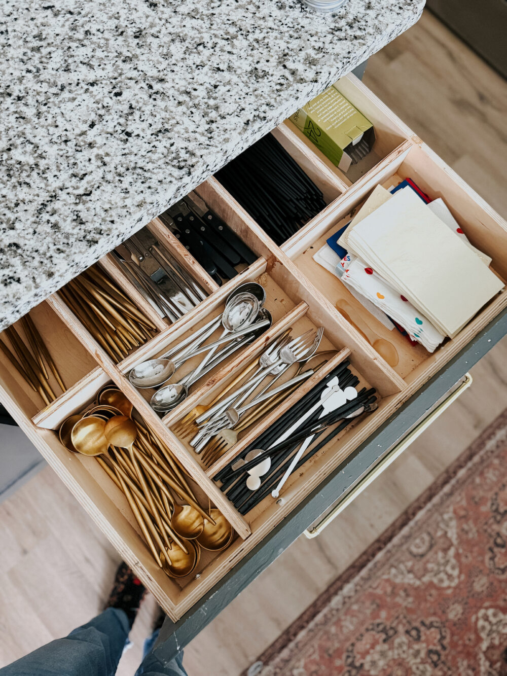 Open silverware drawer with a DIY drawer divider 