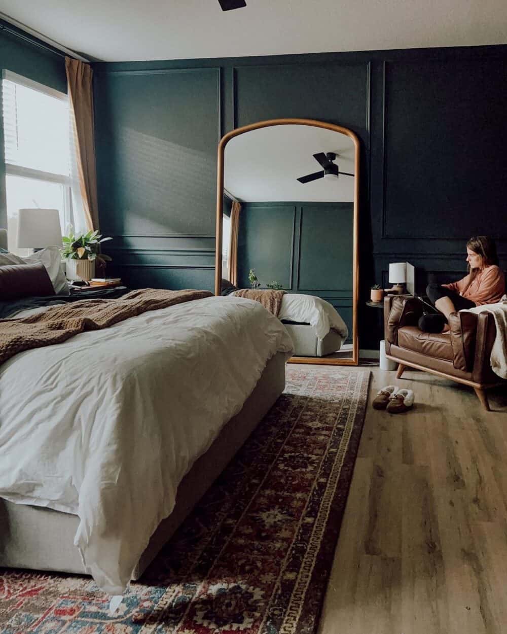 bedroom with dark painted walls 