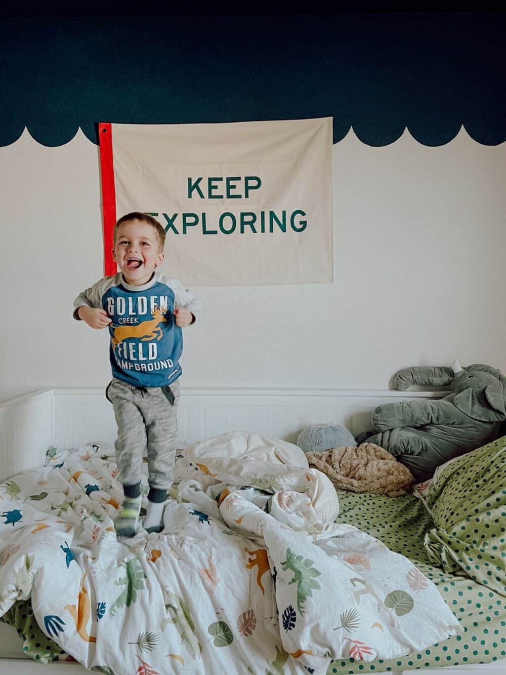 toddler jumping on the bed 