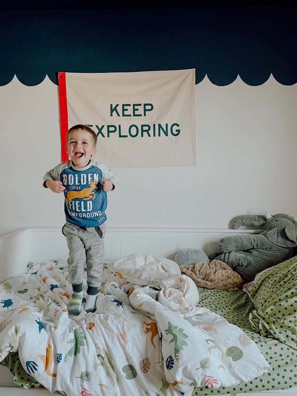 toddler jumping on the bed