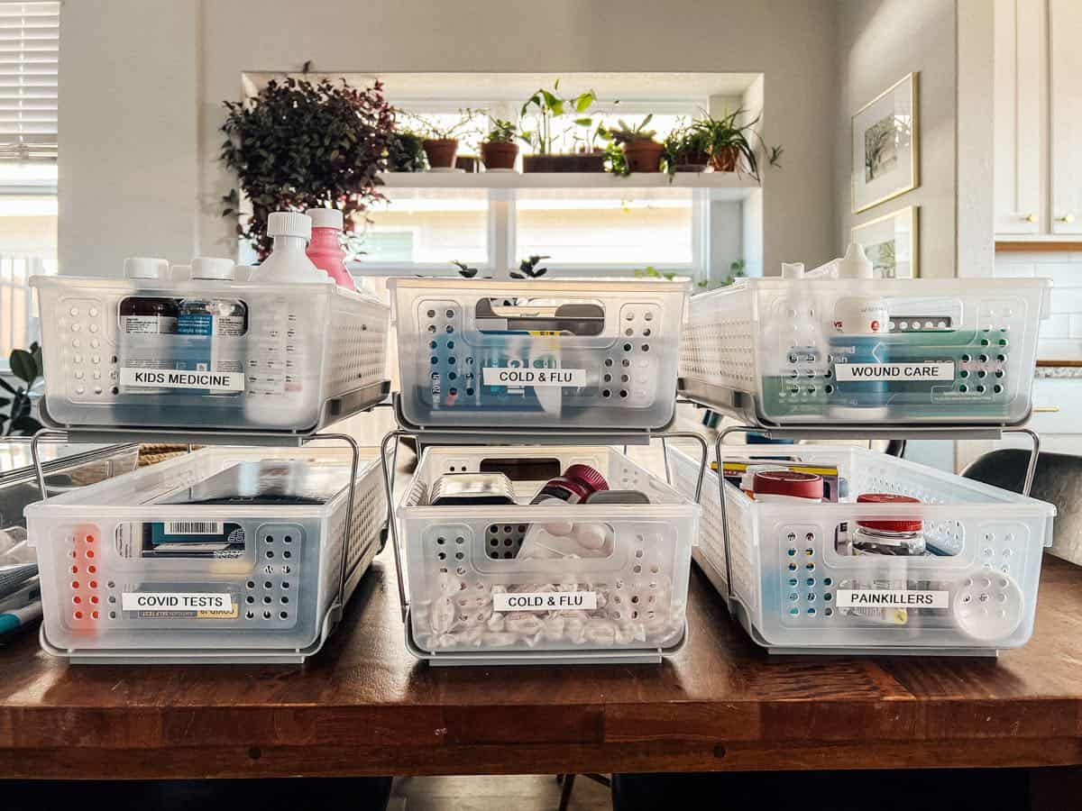three medicine cabinet organizers lined up on a table