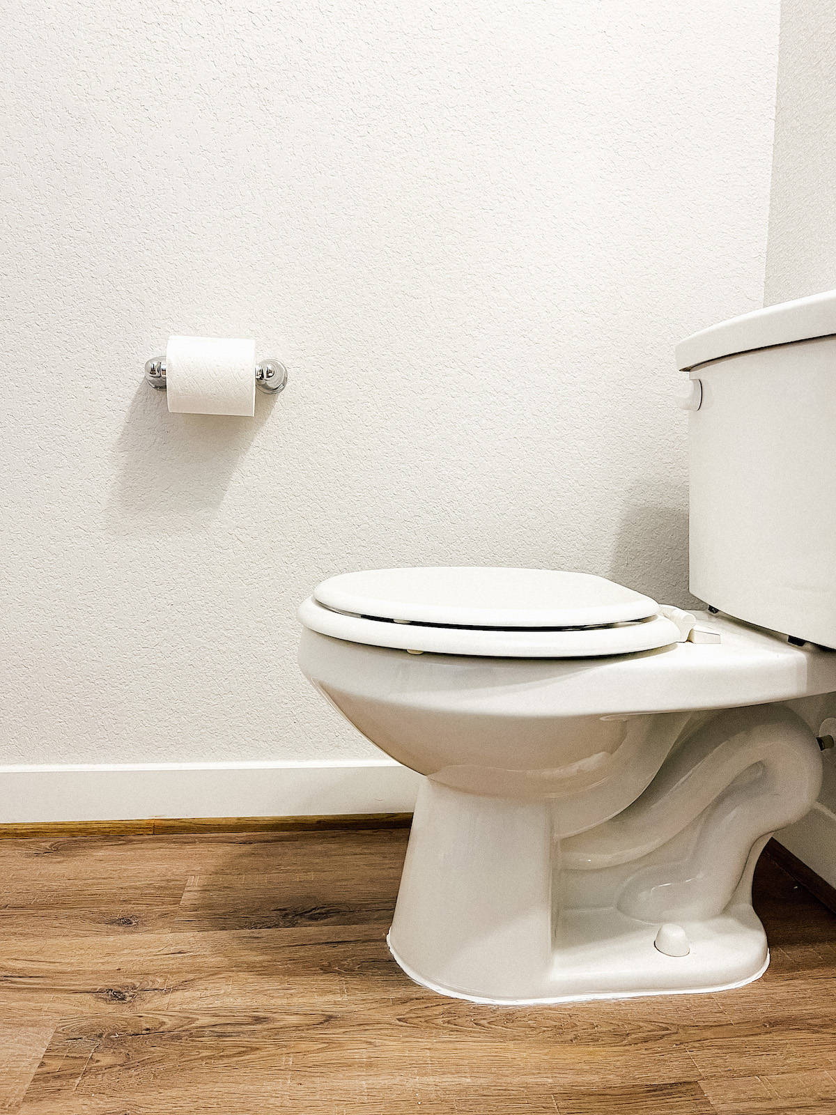 How to Caulk Around the Toilet Love & Renovations