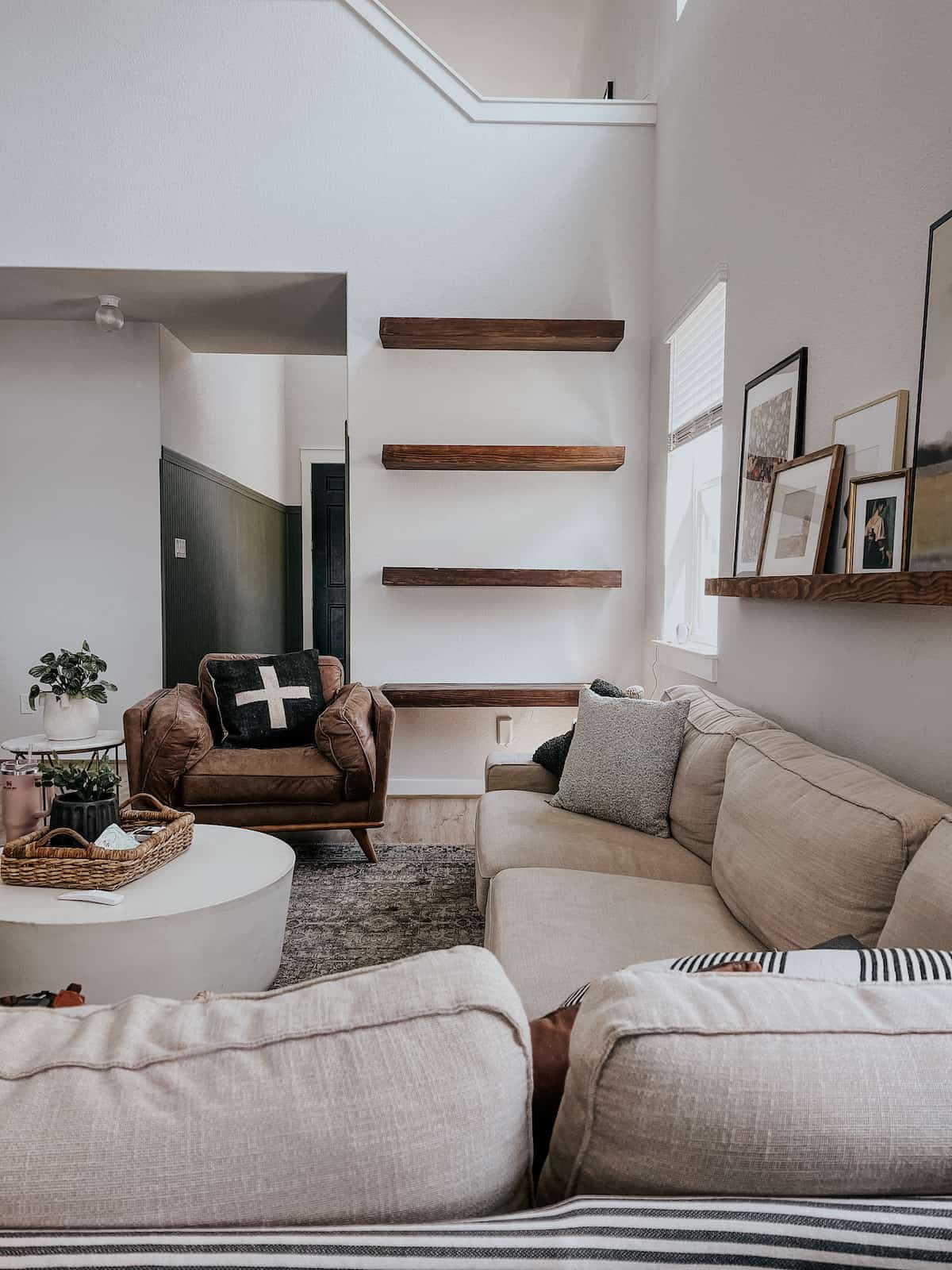 empty shelves on a living room wall