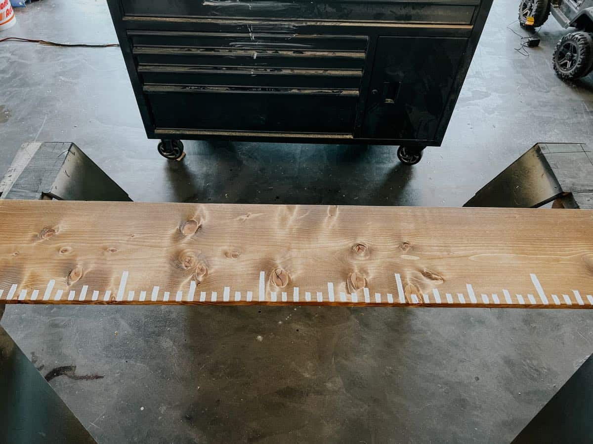 Wooden growth chart with ruler markings