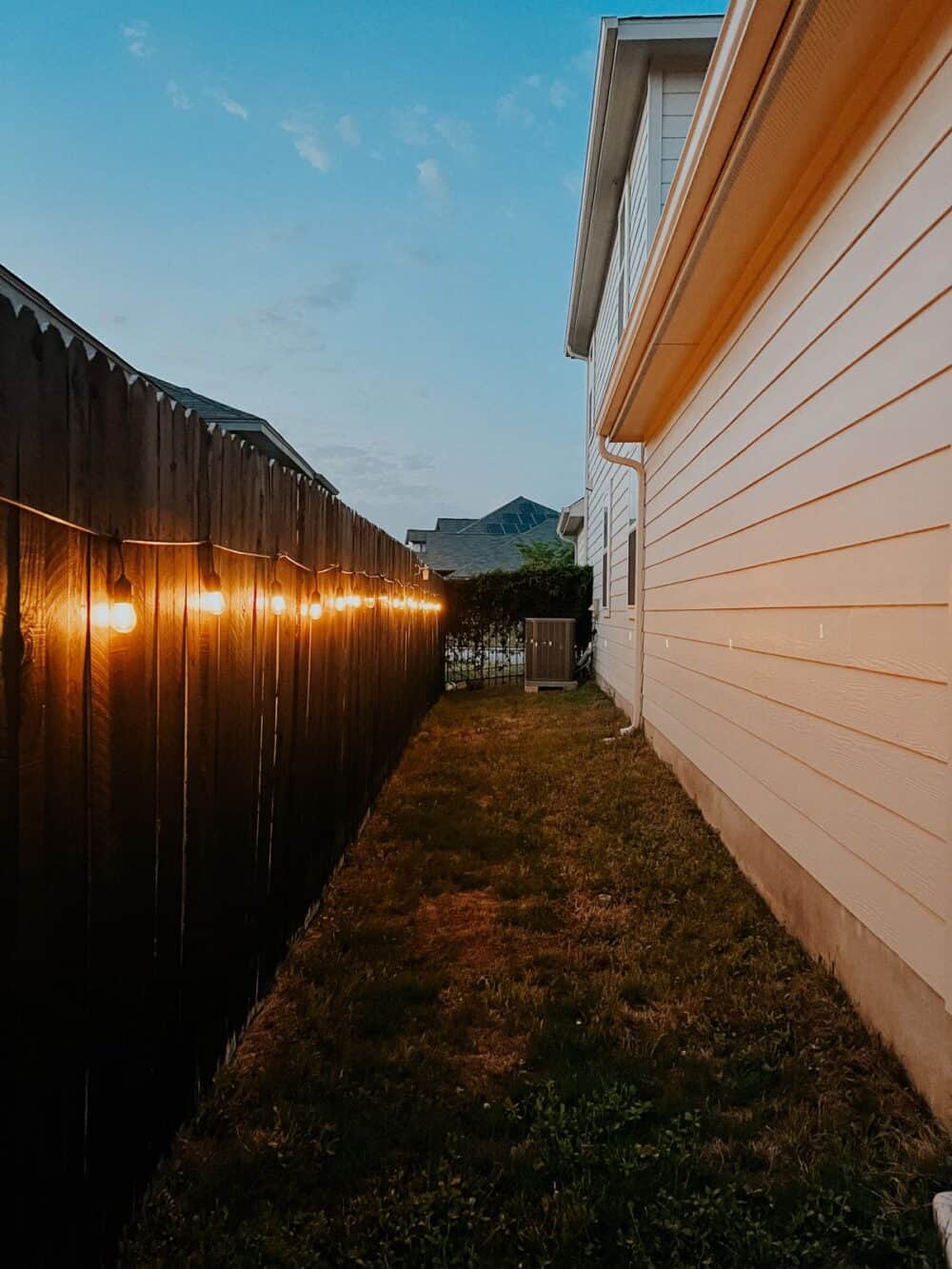 Side yard with string lights 