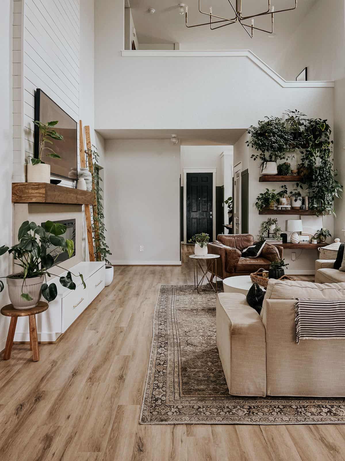 living room with a Frame TV hung above the fireplace