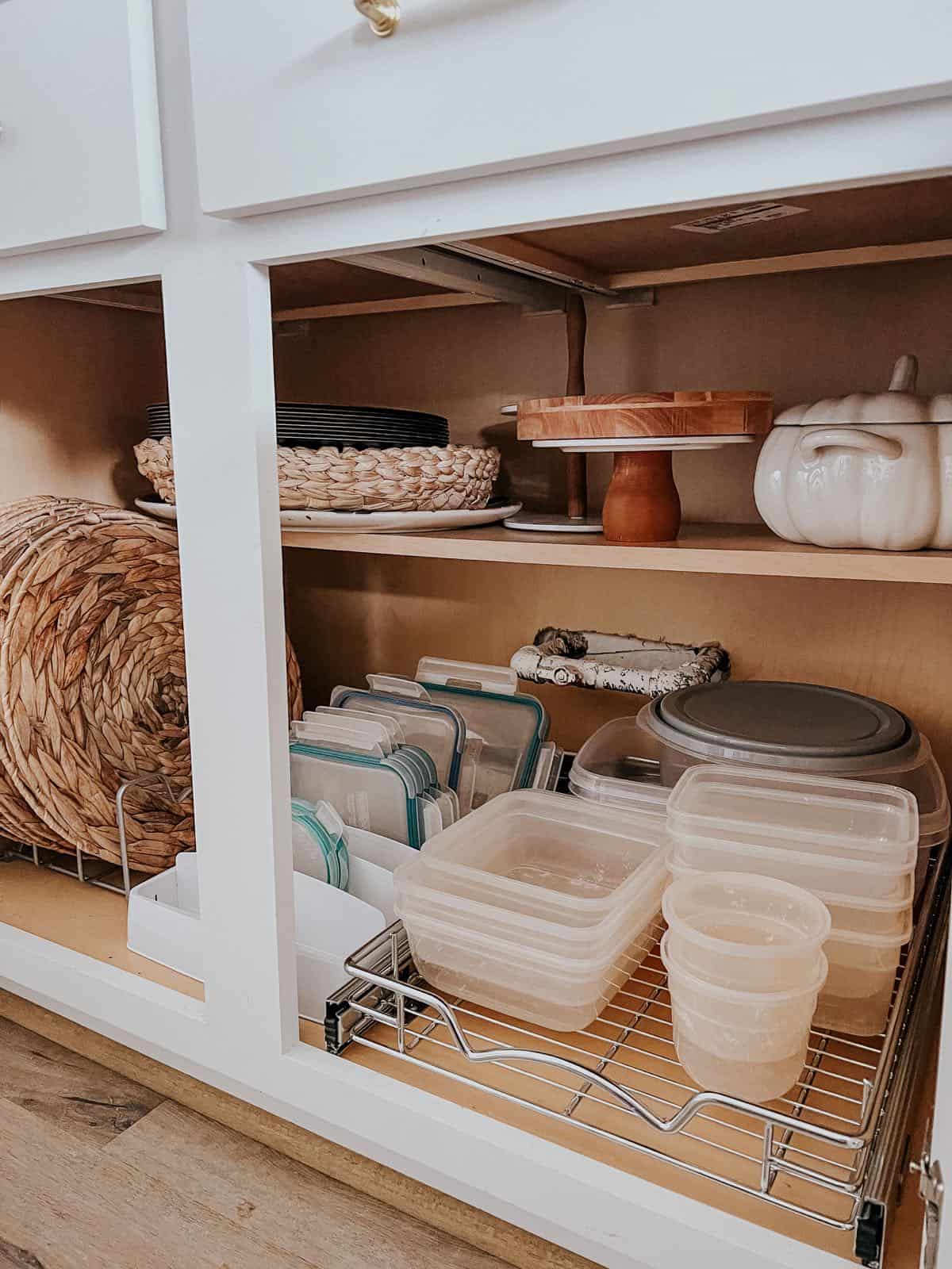 Organized kitchen cabinet with tupperware