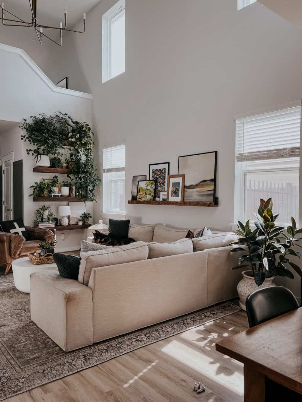 neutral living room with floating shelves 