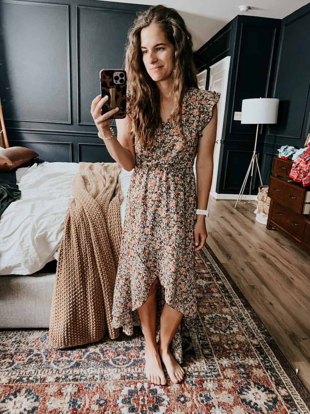 Woman in a tan floral dress 