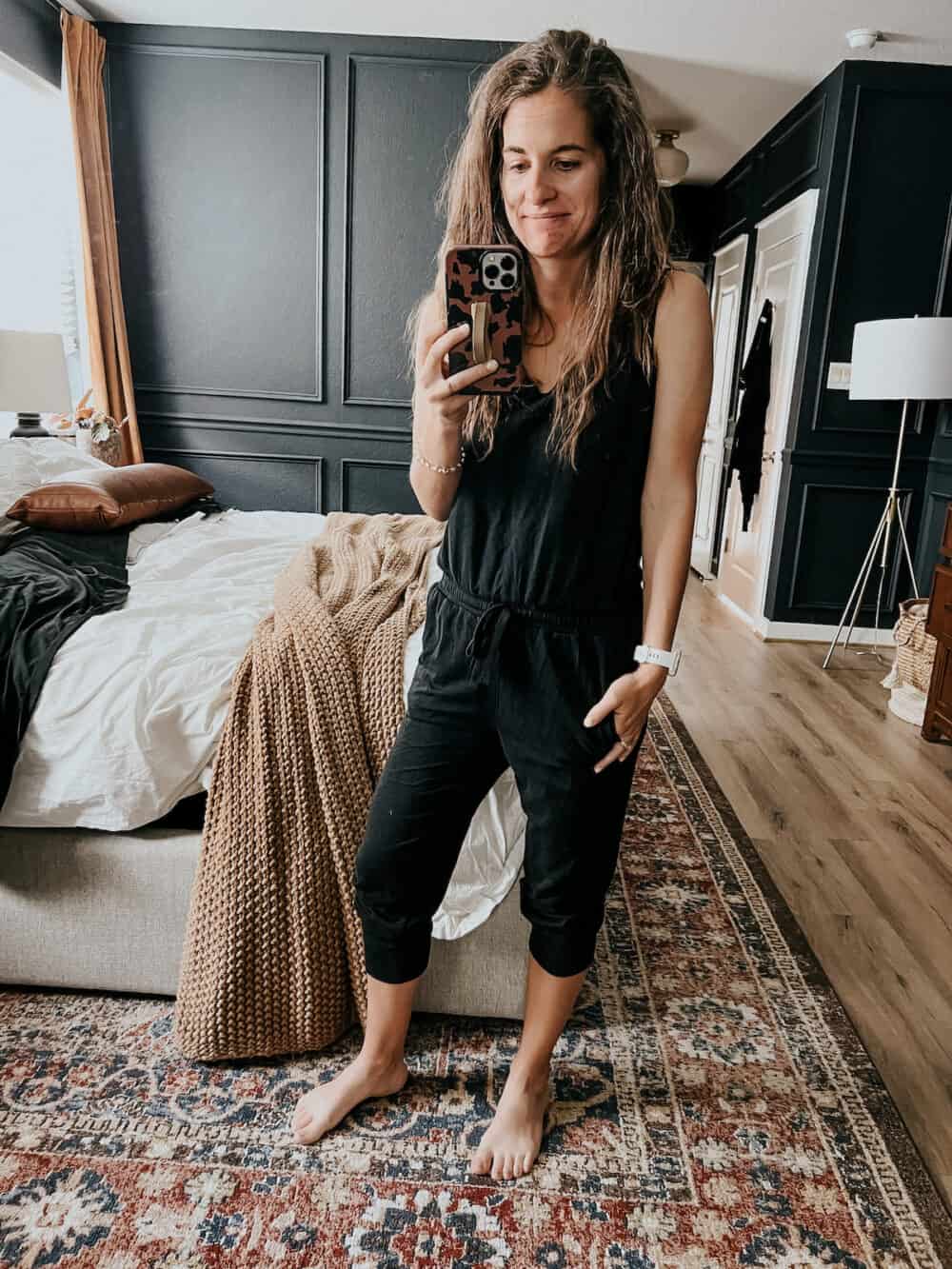 Woman in a black jumpsuit 