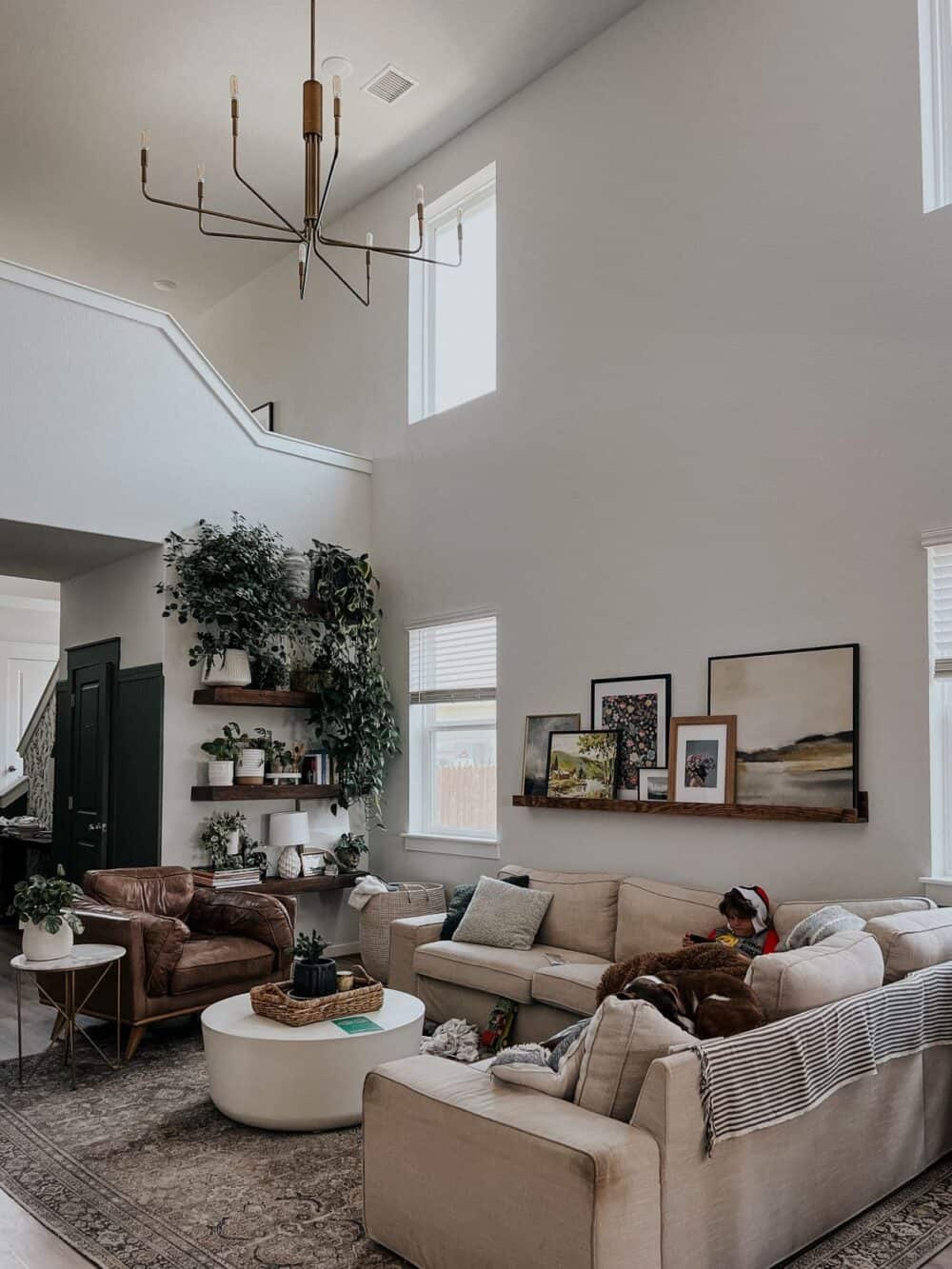 A neutral, cozy, lived-in living room 