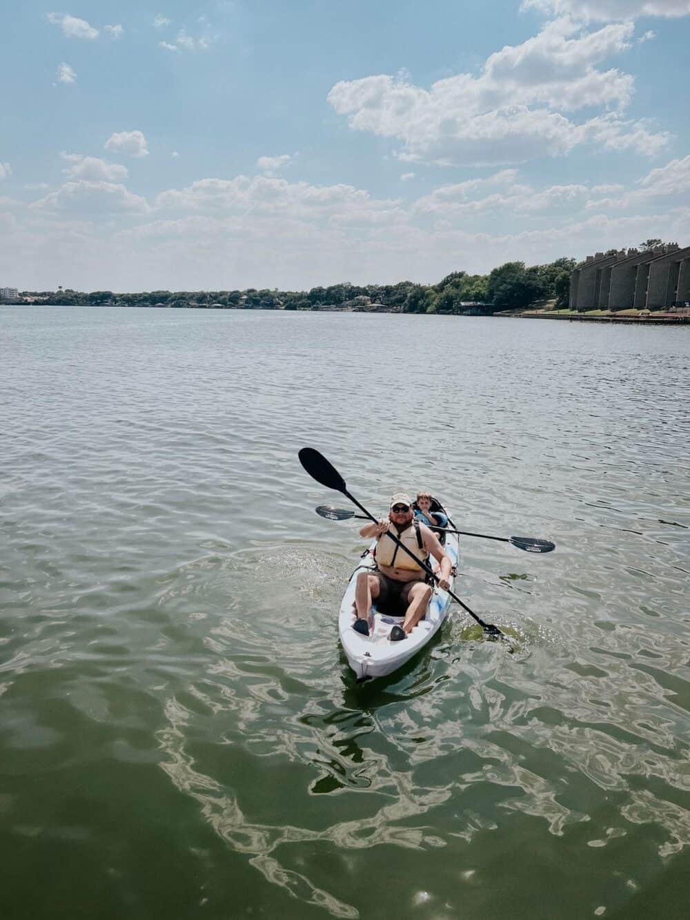 Father and son kayaking on Lake Granbury