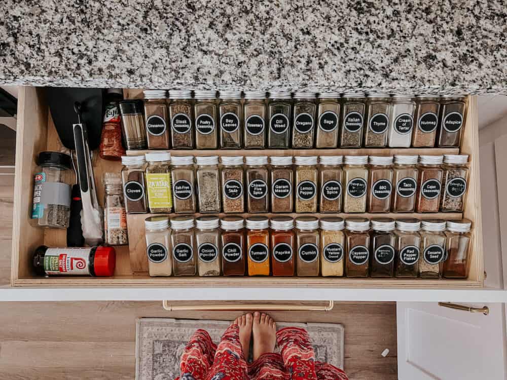 overhead view of a spice drawer that has been organized 