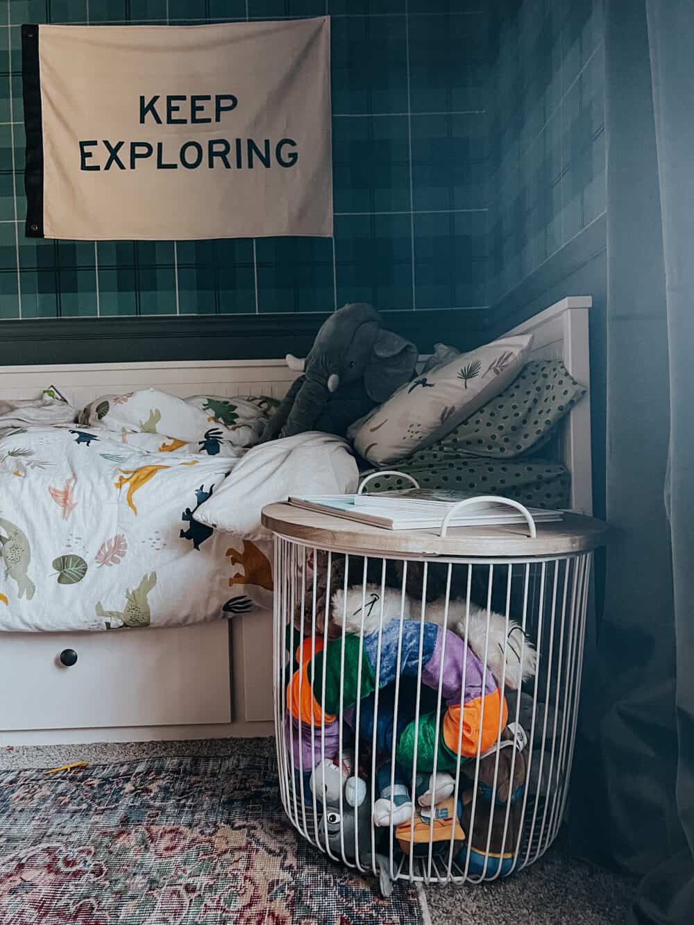 A storage table with stuffed animals in it