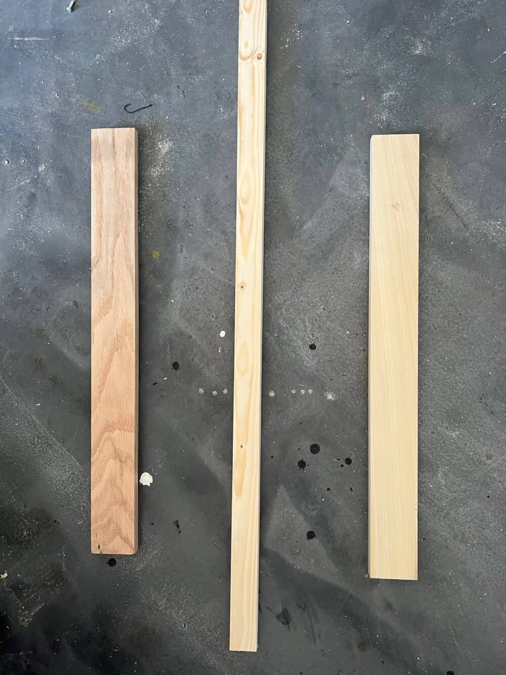 a piece of pine, poplar, and red oak wood 