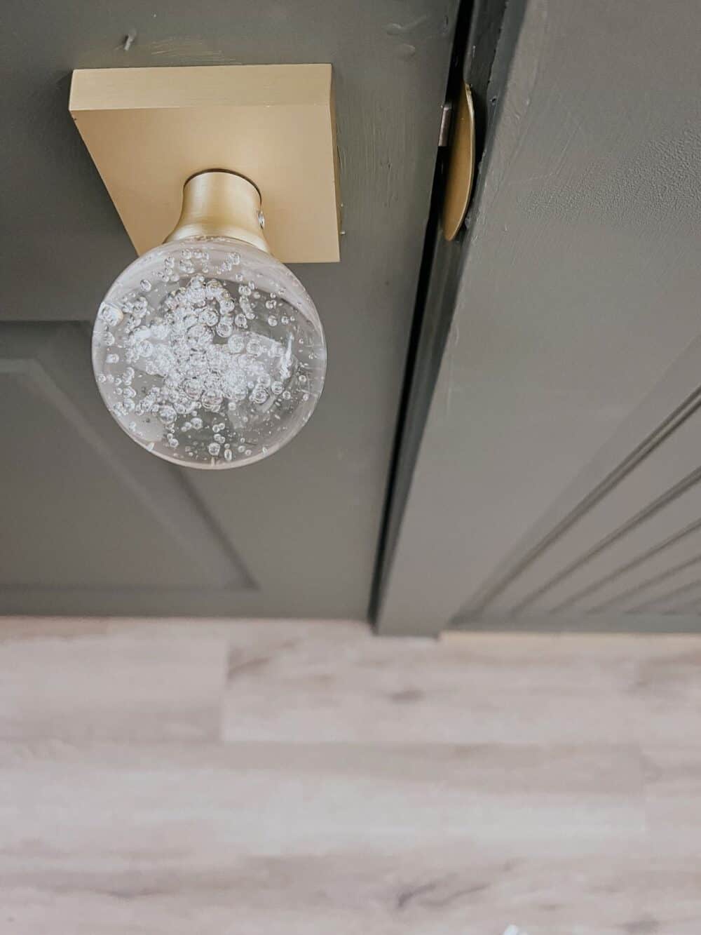 close up of a gold crystal door knob 