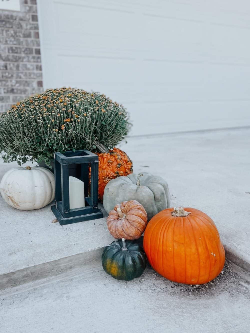 front porch steps with pumpkins 