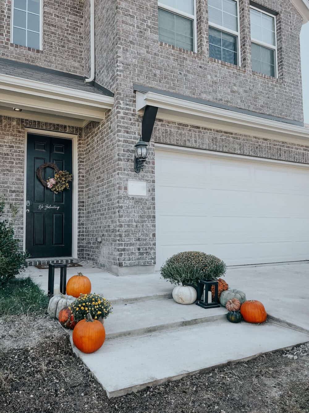 Front yard of a home with concrete steps