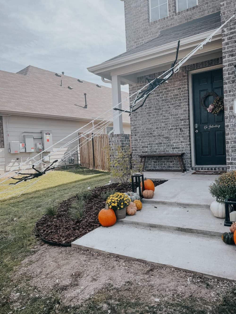 front of home decorated for halloween