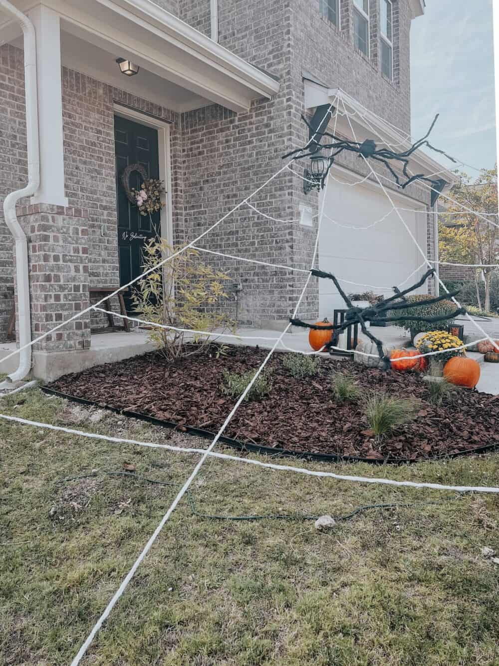 home with giant spider web 