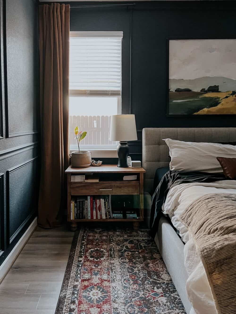 dark bedroom with gold curtains 