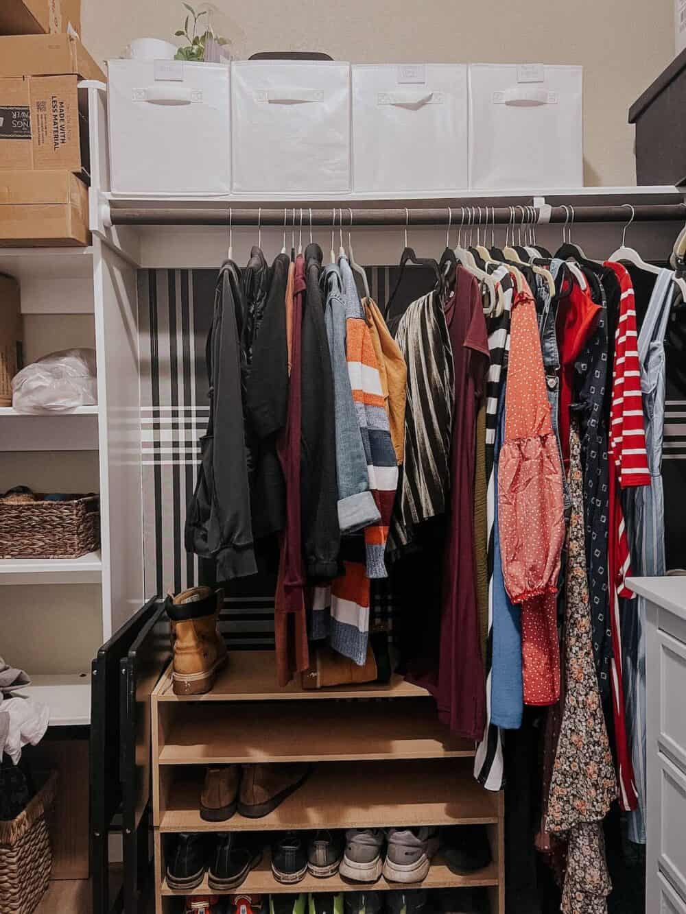 closet with matching baskets on top shelf 