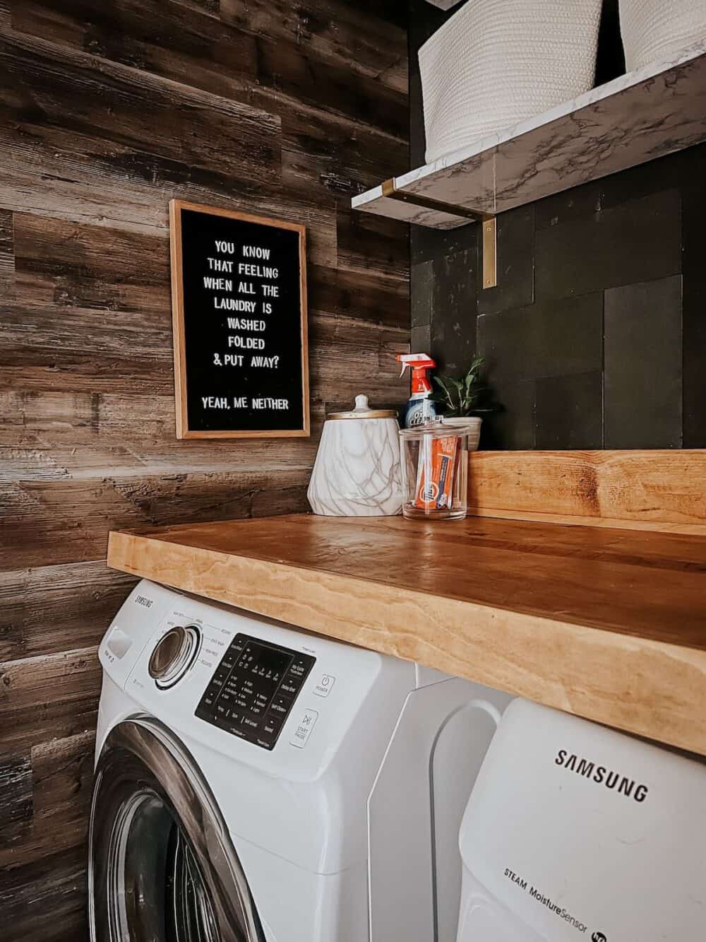 wood accent wall in a laundry room 