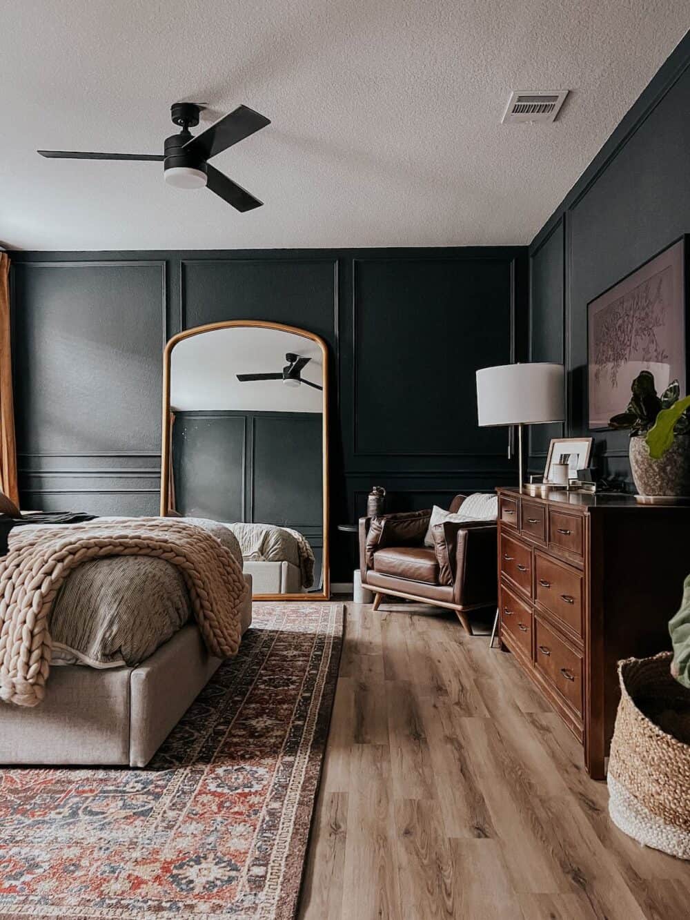 bedroom with dark blue walls 